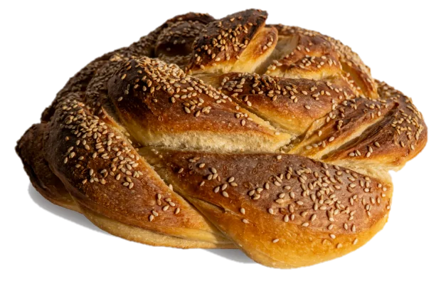 Pletenica od šest pramenova, premazana jajetom i gusto posuta susamom.